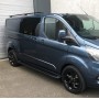 Barras de transporte personalizadas Ford Transit - Negro